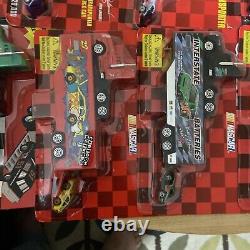 24 pc. Lot Racing Champions Nascar racing team transporters HO scale NIB withcars