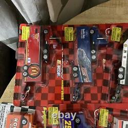 24 pc. Lot Racing Champions Nascar racing team transporters HO scale NIB withcars