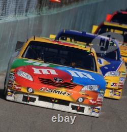 Kyle Busch 2010 Autographed Namerail Sheetmetal Race Used NASCAR M&M's #18 COA