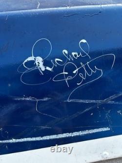 Richard Petty, Aric Almirola, Reed Sorenson Autograph Right Quaterpanel Race Used