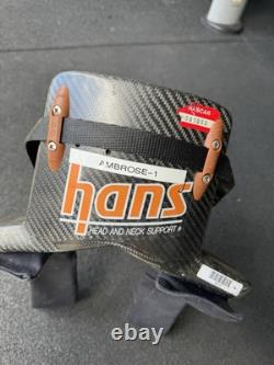 Dispositif Hans utilisé et signé par Marcus Ambrose lors de la course de 2011. Rare