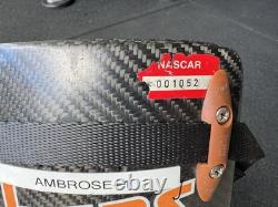 Dispositif Hans utilisé et signé par Marcus Ambrose lors de la course de 2011. Rare