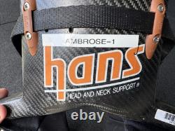 Dispositif Hans utilisé et signé par Marcus Ambrose lors de la course de 2011. Rare