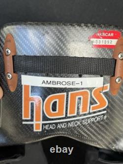 Dispositif Hans utilisé et signé par Marcus Ambrose lors de la course de 2011. Rare