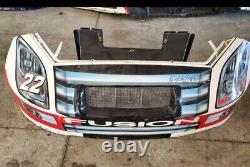 Kenny Wallace NASCAR pièce de tôle utilisée en course Bumper avant #22 Autozone dédicacée
