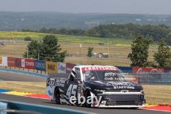 PANEL DE NOSE EN MÉTAL SIGNÉ Connor Zilisch #45 2025 UTILISÉ EN COURSE NASCAR