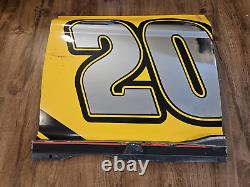 Panneau de métal de porte utilisé lors de la course de Watkins Glen 2022 de Christopher Bell #20