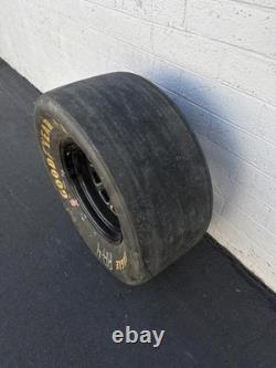 Pneu et jante Goodyear Eagle #1 NASCAR slick authentique utilisé en course - Man Cave / Collection Pneu et jante Goodyear Eagle #1 NASCAR slick authentique utilisé en course - Man Cave / Collection