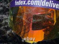 Visière de casque signée utilisée par Denny Hamlin en course NASCAR Toyota Joe Gibbs Racing