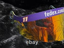 Visière de casque signée utilisée par Denny Hamlin en course NASCAR Toyota Joe Gibbs Racing